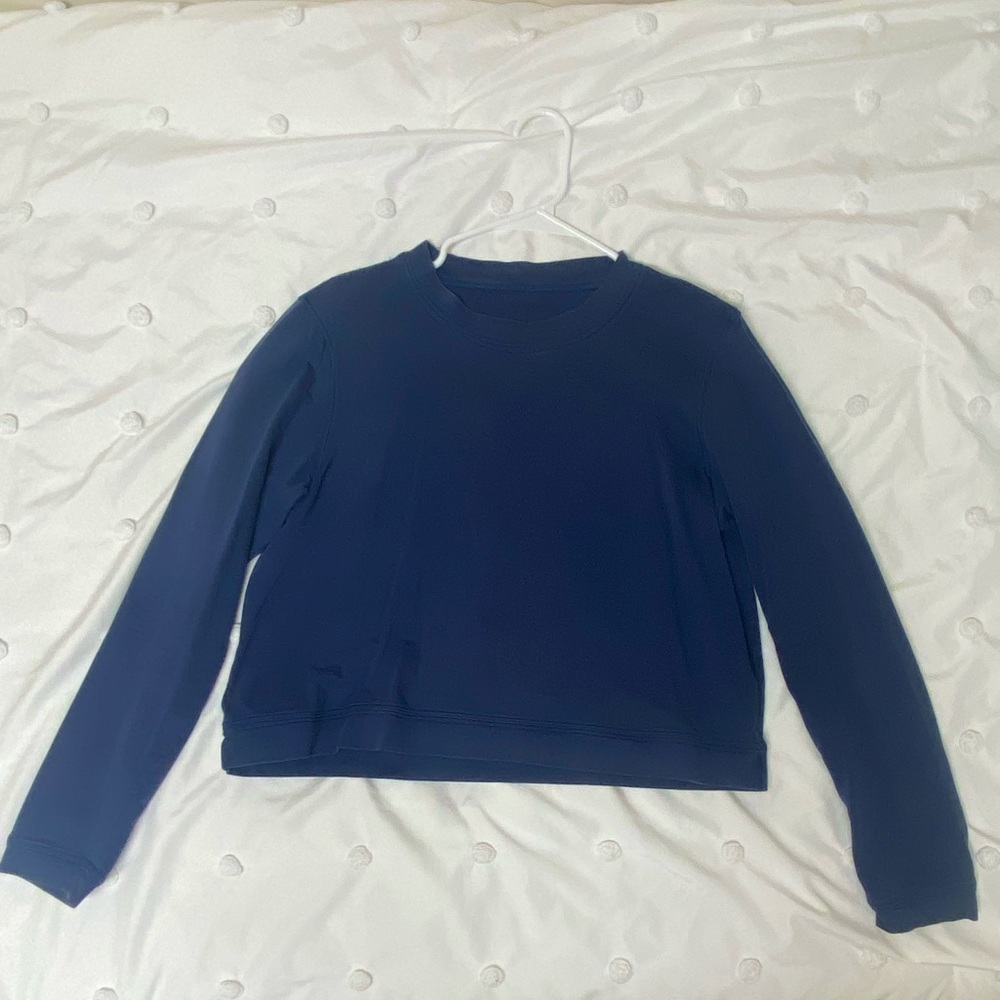 McCaulou’s navy blue long sleeve shirt